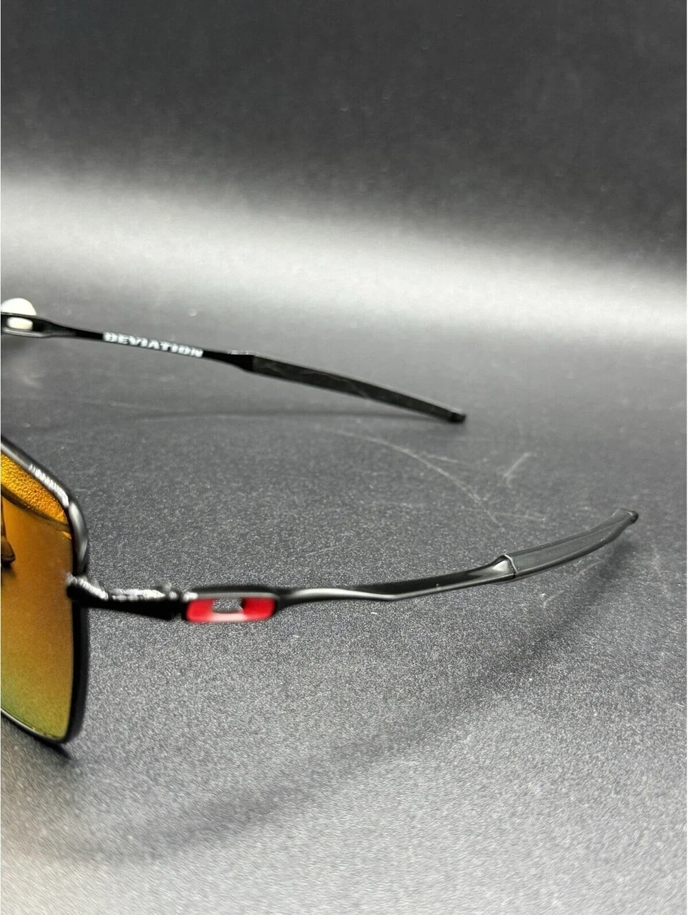 Oakley Deviation Polished Black/Ruby Iridium Lenses OO4061-04